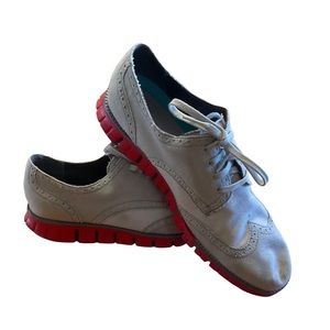 Coke Haan white Buc with red soles. Sixe 10.5